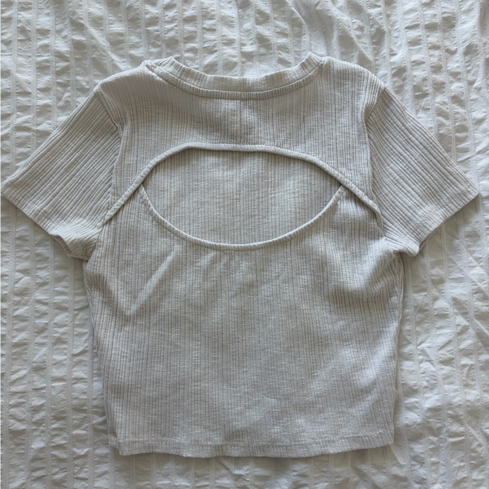 American Eagle cream coloured short sleeve top with cut out back